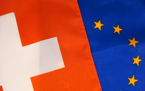 The flags of Switzerland and the EU