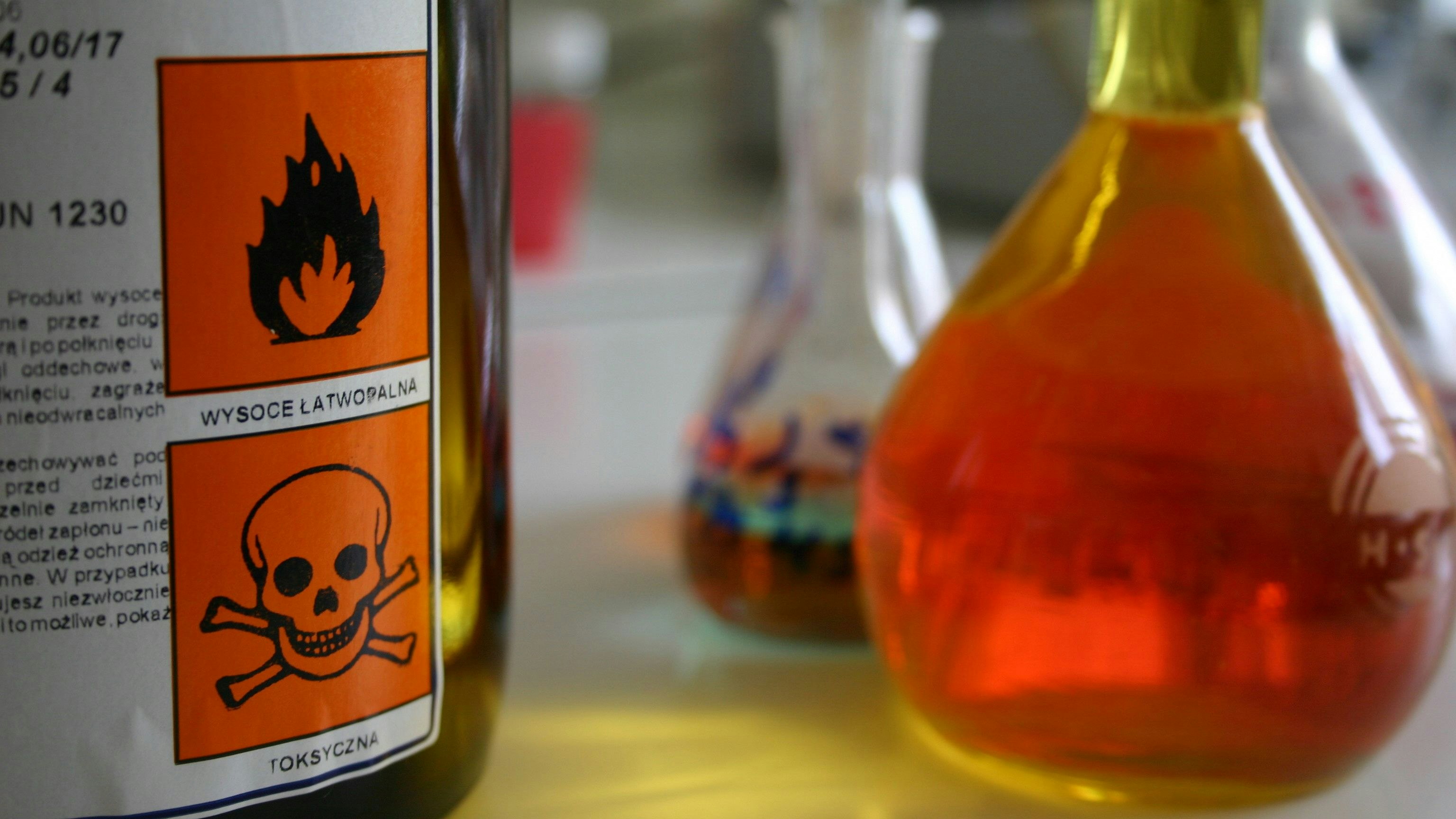 Glass displaying chemical warning signs